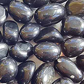 Highly polished Apache Tears tumble stone size 2-3 cm. www.naturalhealingshop.co.uk based in Nuneaton for crystals, spiritual healing, meditation, relaxation, spiritual development,workshops.